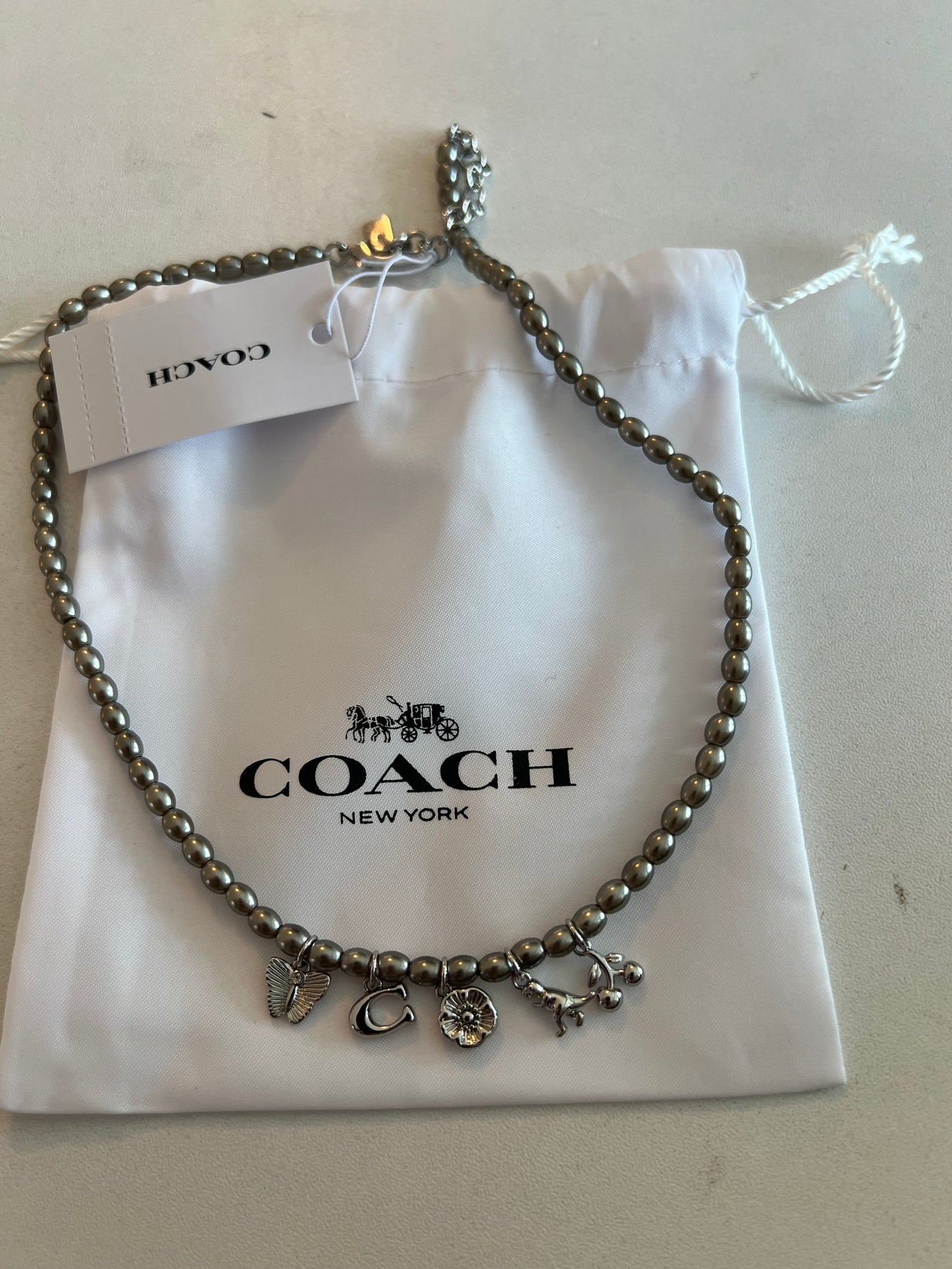 Coach Silver Toned Charm Necklace