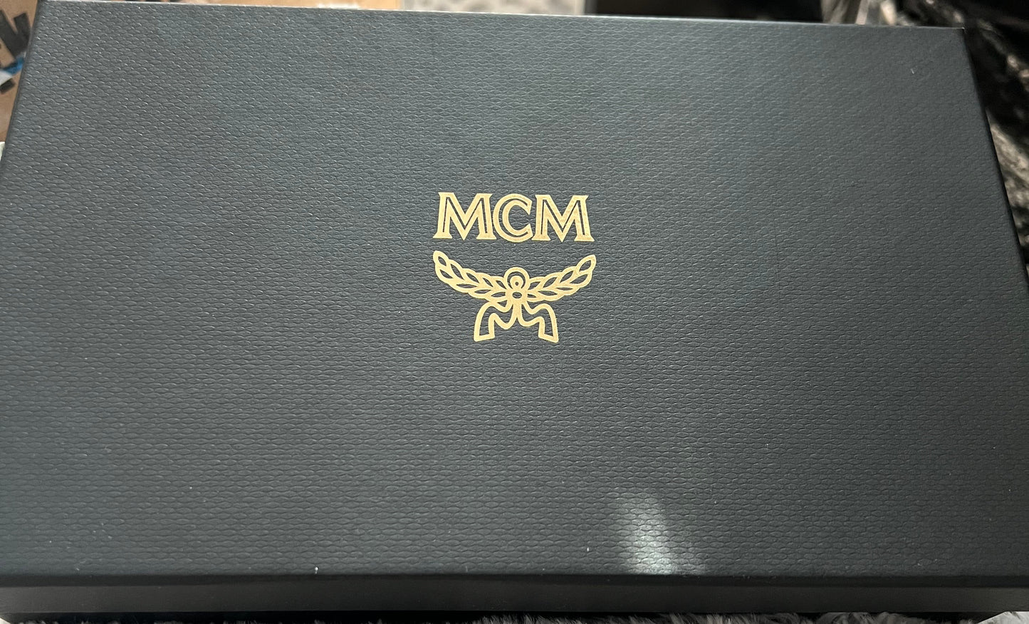 MCM Blue Himmel Continental Pouch - Embossed Leather