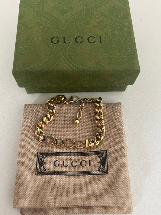 Gucci Gold Toned Script Chain Bracelet