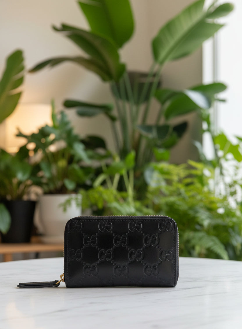 Gucci Black Leather Embossed Compact Zip Wallet