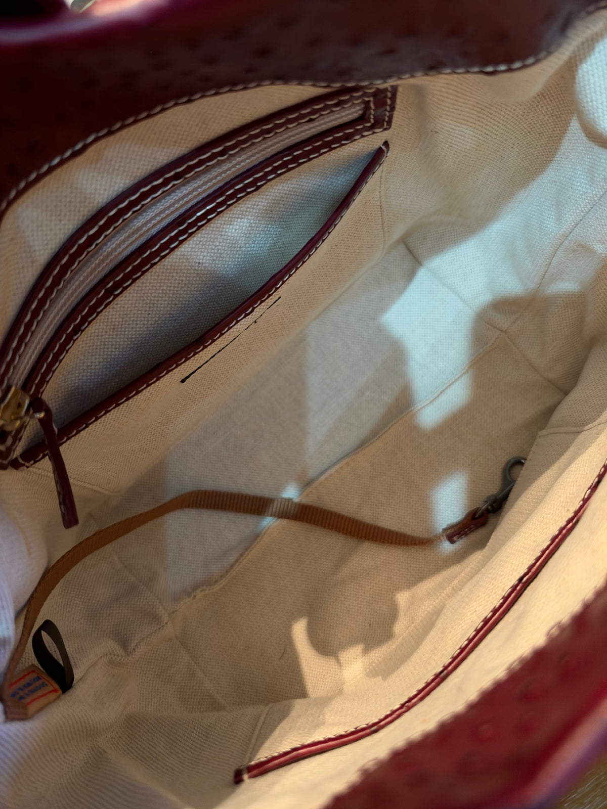 Dooney & Bourke Embossed Ostrich Logo Lock Hobo