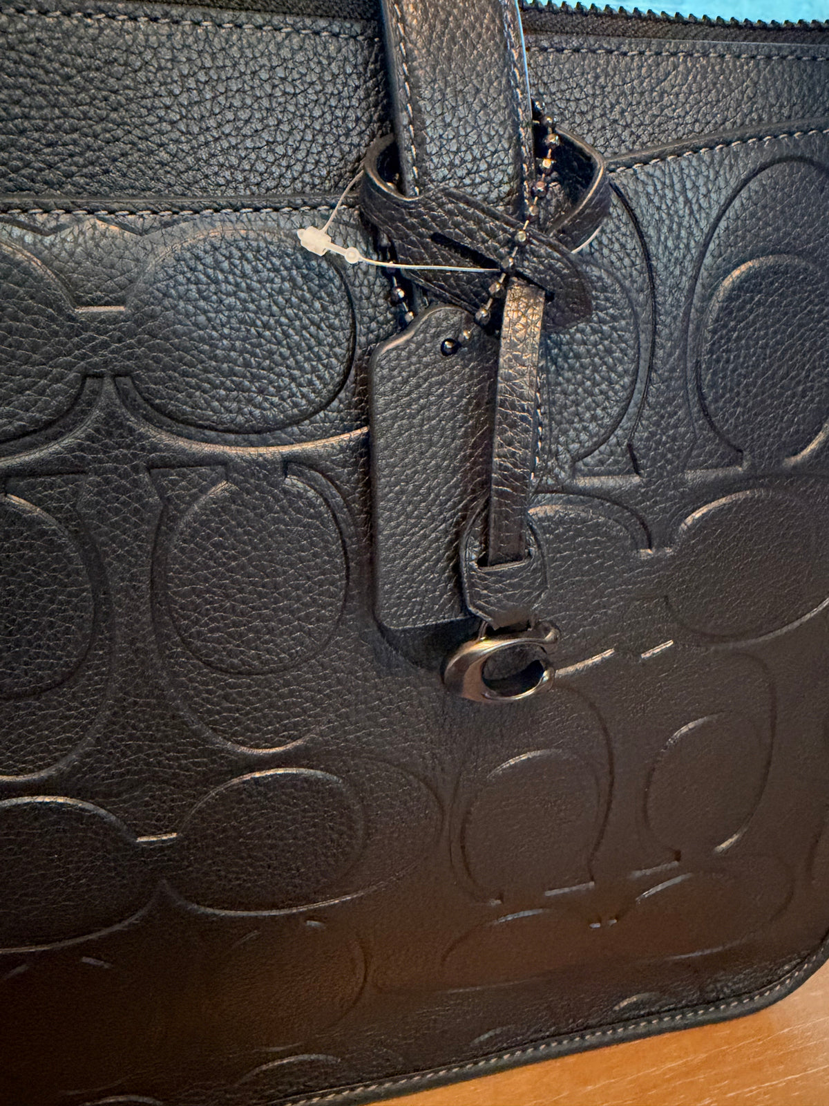 Coach Isaac Embossed Leather Bag